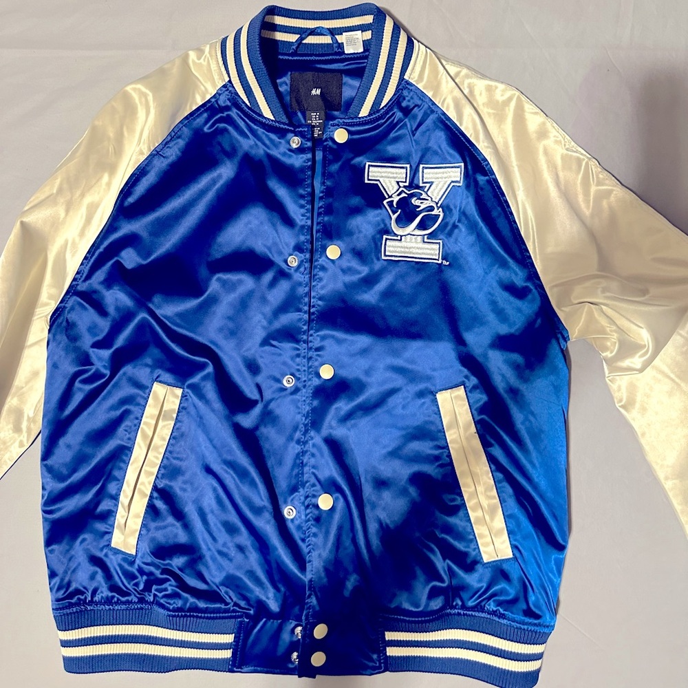 Used Yale bomber jacket from H&M men’s size medium and blue and cream color